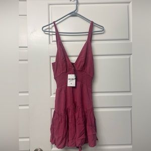 Fashion Nova pink romper.